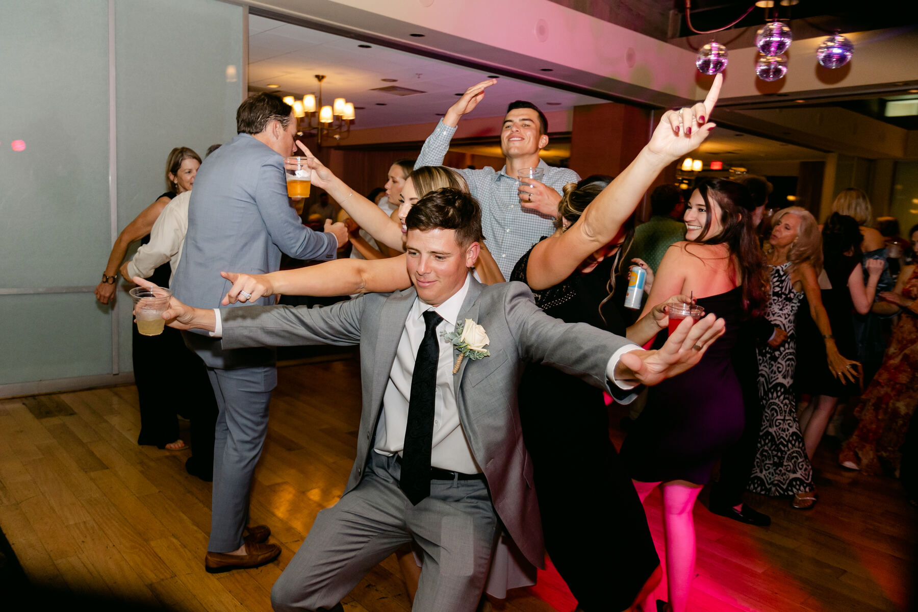 A guest getting low on the dance floor